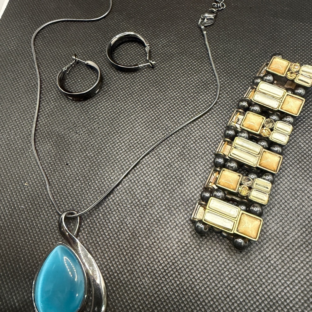 Lia Sophia Deep Sea/Waterway Blue Cat's Eye Hematite Teardrop Pendant and more